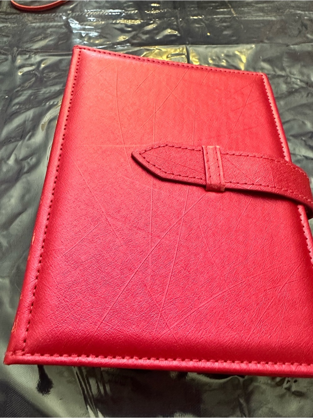 Sleek pink Faux Leather earring holder . Great for travel
